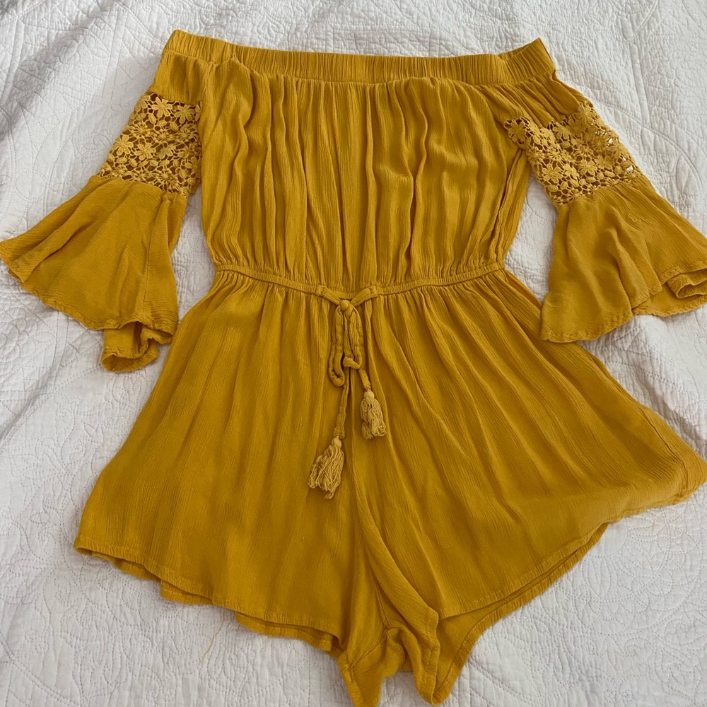 Yellow romper. Mustard color. Good condition